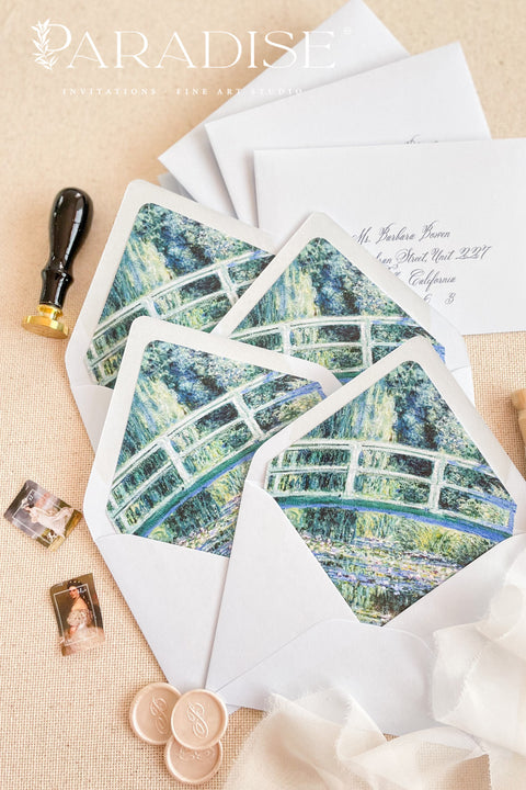 Haze wedding envelopes with art-inspired envelope liners, styled flat lay with wax seals and ribbon, showcasing painterly liner artwork for luxury invitations.