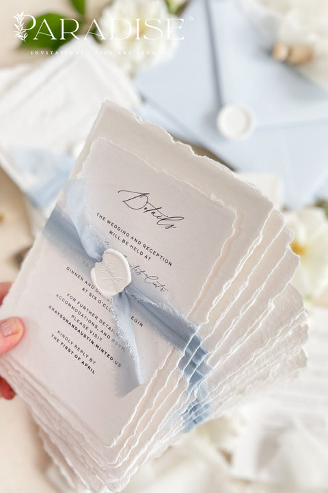 This exquisite invitation sets suite offers a blend of modern sophistication and natural beauty. Perfect for a beach wedding, these personalised invites feature a stunning, modern clean calligraphy design printed on luxurious handmade cotton paper. The tactile, rich feel of the paper beautifully complements the elegant and contemporary typography, setting a fresh and personal tone for your special day.