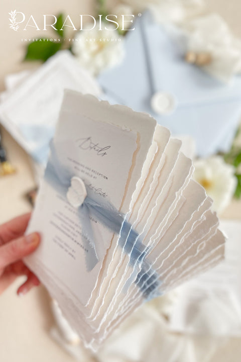 This exquisite invitation sets suite offers a blend of modern sophistication and natural beauty. Perfect for a beach wedding, these personalised invites feature a stunning, modern clean calligraphy design printed on luxurious handmade cotton paper. The tactile, rich feel of the paper beautifully complements the elegant and contemporary typography, setting a fresh and personal tone for your special day.