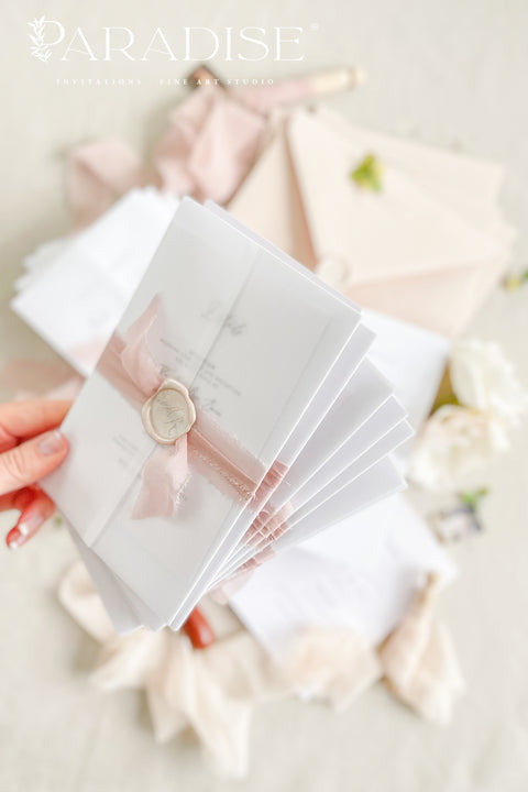 Delicate, romantic, and effortlessly graceful - this letterpress wedding invitation suite blends modern minimalism with artisanal charm. Each piece is crafted on thick, premium cotton paper, with deep letterpress impressions that capture the poetry of fine stationery. Wrapped in translucent vellum, tied with a blush silk ribbon, and finished with a wax seal, this suite is designed for couples who appreciate sophistication in every detail.