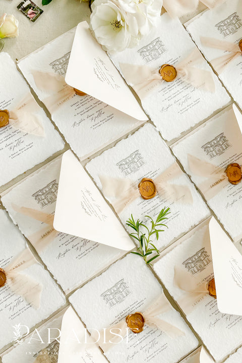 Announce your special day with a timeless and deeply personal touch with these exquisite wedding invitations. Each invite is a beautiful work of art, featuring a bespoke wedding venue illustration, hand-drawn by us to capture the unique charm of your location. Printed on luxurious handmade paper, this suite offers a rich, tactile experience and a classy and elegant stationery design that your guests will cherish.
