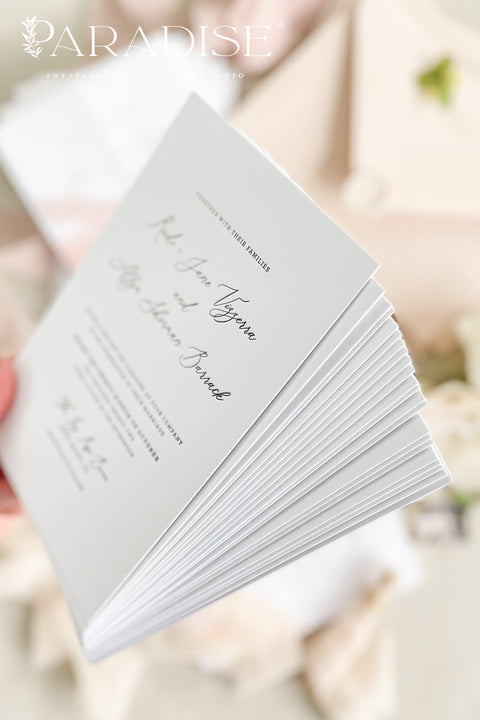 Delicate, romantic, and effortlessly graceful - this letterpress wedding invitation suite blends modern minimalism with artisanal charm. Each piece is crafted on thick, premium cotton paper, with deep letterpress impressions that capture the poetry of fine stationery. Wrapped in translucent vellum, tied with a blush silk ribbon, and finished with a wax seal, this suite is designed for couples who appreciate sophistication in every detail.