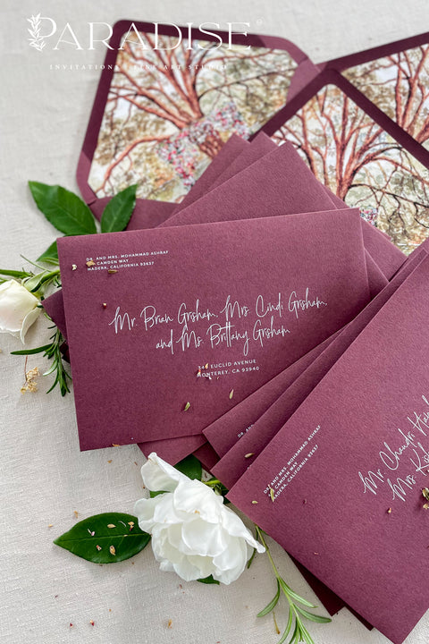 Burgundy wedding envelopes with white ink address printing, crafted from premium paper and styled to showcase rich color, smooth texture, and elegant typography.