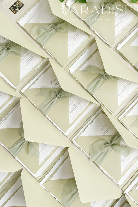 Announce your special day with the serene beauty of these cotton rag handmade paper wedding invitations. Perfect for a garden wedding, this suite captures the natural elegance of your event with a fresh sage theme and a delicate olive branch design. The olive invites are printed on premium, artisan paper with a natural deckle edge, providing a truly organic and luxurious feel that will enchant your guests.