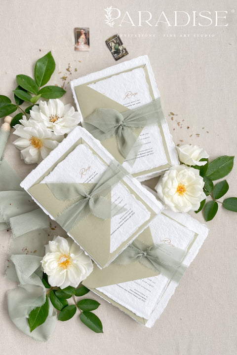 Announce your special day with the serene beauty of these cotton rag handmade paper wedding invitations. Perfect for a garden wedding, this suite captures the natural elegance of your event with a fresh sage theme and a delicate olive branch design. The olive invites are printed on premium, artisan paper with a natural deckle edge, providing a truly organic and luxurious feel that will enchant your guests.