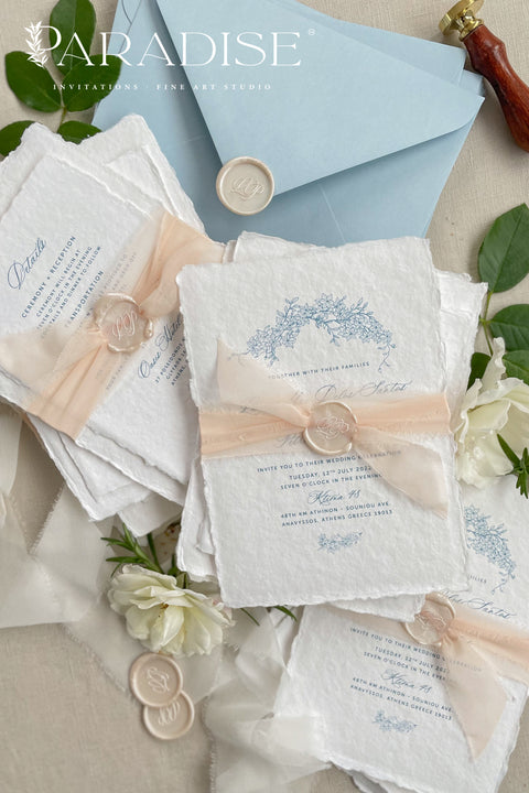 Announce your seaside celebration with these beautifully crafted handmade paper wedding invitations. Perfect for a beach wedding, this suite combines a relaxed, coastal feel with the refined elegance of artisan cotton rag paper. Each invitation features a delicate botanical design that evokes the natural beauty of the shoreline, from swaying palms to coastal foliage. The unique, deckled-edge paper adds a rustic, organic texture that is perfectly suited for a romantic oceanfront ceremony.