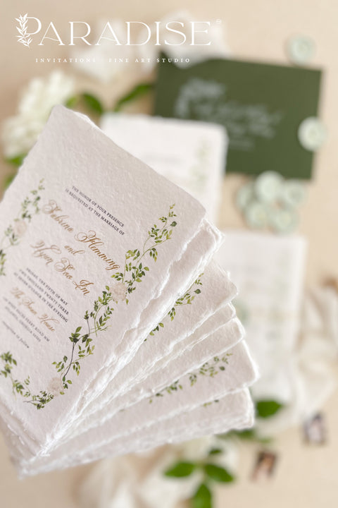 Announce your special day with the delicate, artistic beauty of a hand-painted touch. This wedding invitation set features a one-of-a-kind custom venue illustration, beautifully rendered in soft watercolor, making it a deeply personal keepsake. The custom artwork is elegantly framed by lush botanical details, creating a harmonious and enchanting design that is perfect for a garden wedding, an outdoor celebration, or any couple who loves a unique and whimsical aesthetic.