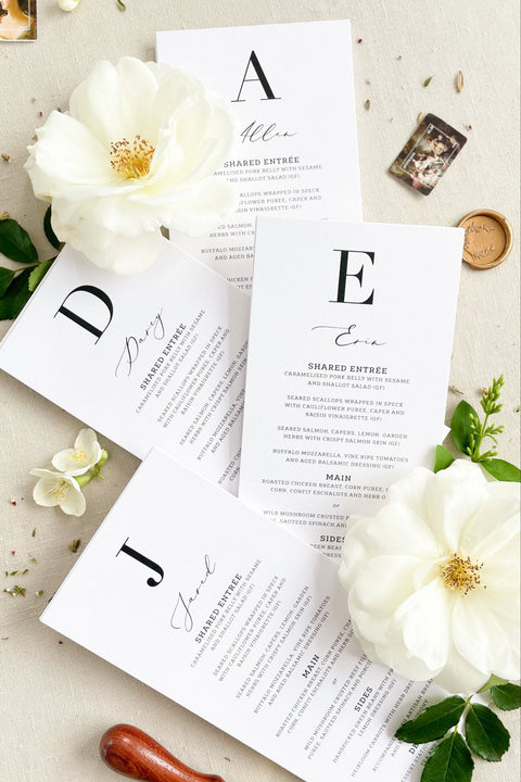 Make a bold statement at your reception with our modern monogram wedding menus, featuring a minimalist design and refined typography. Printed on luxury textured cardstock, each piece blends clean lines with personalized details - a timeless fusion of sophistication and simplicity. Perfect for fine-art, modern, or black-tie weddings, these menus elevate your table styling while showcasing your unique initials.