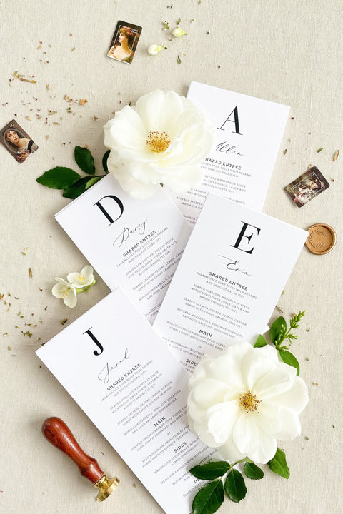 Make a bold statement at your reception with our modern monogram wedding menus, featuring a minimalist design and refined typography. Printed on luxury textured cardstock, each piece blends clean lines with personalized details - a timeless fusion of sophistication and simplicity. Perfect for fine-art, modern, or black-tie weddings, these menus elevate your table styling while showcasing your unique initials.