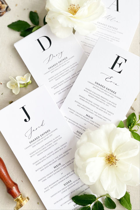 Make a bold statement at your reception with our modern monogram wedding menus, featuring a minimalist design and refined typography. Printed on luxury textured cardstock, each piece blends clean lines with personalized details - a timeless fusion of sophistication and simplicity. Perfect for fine-art, modern, or black-tie weddings, these menus elevate your table styling while showcasing your unique initials.