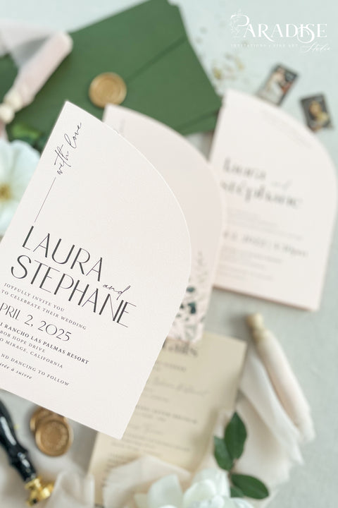 This half arch wedding invitation suite is a perfect blend of modern design and romantic artistry, crafted for couples who adore contemporary elegance with a soft, organic touch. Featuring a unique half-arched silhouette, this suite brings a sculptural dimension to your stationery - minimal yet undeniably striking. Printed on luxury textured cardstock in a delicate blush tone, each piece is complemented by botanical details and refined typography that balance modern minimalism with timeless charm.