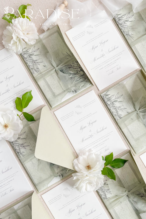Bring natural elegance to your celebration with our vellum wedding invitations, designed with soft sage green accents, modern fine art typography, and translucent vellum wraps tied with ribbon. Each suite is crafted by hand to embody a refined yet organic aesthetic that perfectly suits botanical, garden, or destination weddings. Printed on premium cardstock with delicate botanical illustrations.