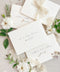 Stack of coco linen envelopes with address printing displaying consistent color, textured paper surface, and structured luxury wedding stationery finish.