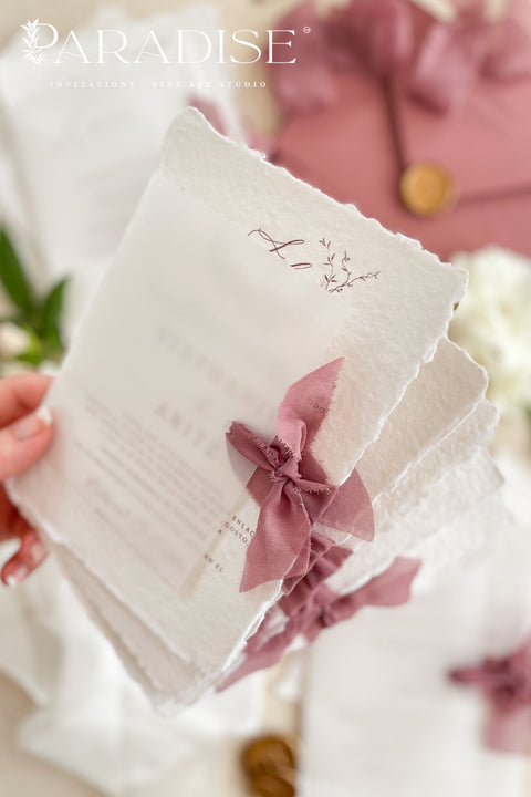 Announce your special day with the timeless beauty of these garden wedding invites. Perfect for a lush, romantic celebration, this suite combines the luxurious, tactile feel of handmade paper with an elegant, personalized monogram. The result is a truly timeless romantic wedding stationery set that feels both classic and intimately personal, leaving a lasting impression on your guests.