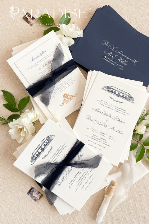 Elegant and refined, this letterpress wedding invitation suite brings classic artistry to modern romance. Featuring a custom hand-drawn illustration of your wedding venue, each piece is printed on luxurious cotton cardstock using the timeless technique of letterpress printing - creating a deep, tactile impression that you can both see and feel. The suite is accented with navy envelopes and tied with a silk ribbon, perfectly balancing sophistication with sentiment.