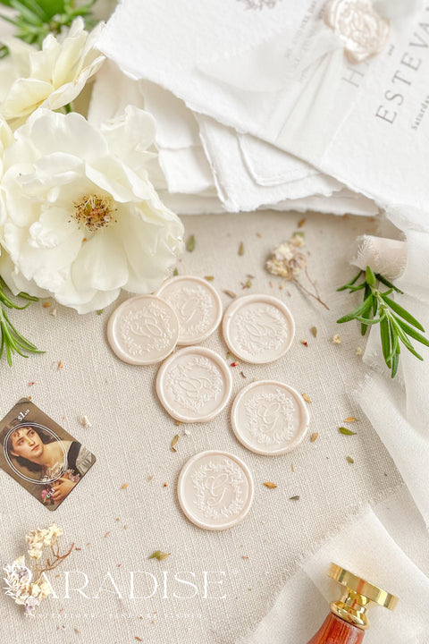 Champagne wax seals bring a soft glow and understated elegance to your wedding stationery, adding a timeless finishing touch to invitations, envelopes, and keepsake details. Hand-poured in a warm champagne tone, each seal offers a delicate balance of classic refinement and modern romance, perfect for elevating both neutral and pastel palettes.