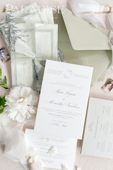 Bring natural elegance to your celebration with our vellum wedding invitations, designed with soft sage green accents, modern fine art typography, and translucent vellum wraps tied with ribbon. Each suite is crafted by hand to embody a refined yet organic aesthetic that perfectly suits botanical, garden, or destination weddings. Printed on premium cardstock with delicate botanical illustrations.