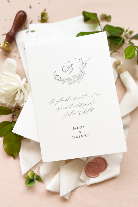 Refined and timeless, our booklet wedding menus are the perfect blend of artistry and sophistication. Printed on luxury textured cardstock, each booklet opens to reveal your curated dining and drink selections in a beautifully balanced layout. The botanical monogram design adds an elegant fine-art touch, while the soft neutral tones and minimalist typography create a polished, romantic aesthetic - ideal for luxury, garden, and destination weddings.