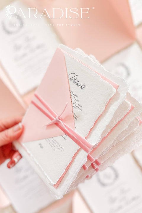 Elevate your wedding with our exquisite Handmade Paper Wedding Invitations featuring beautiful deckled edges. Crafted with love and attention to detail, these elegant invitations are tied together with luxurious silk ribbon, adding a touch of sophistication to your special day. Each piece is uniquely handmade, ensuring your announcements are as one-of-a-kind as your love story.