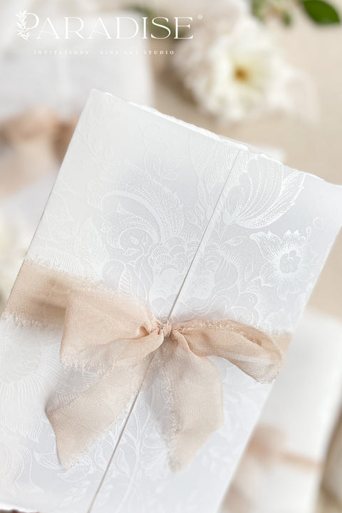 Elegant, timeless, and deeply personal - our handmade wedding invitations with a hand-drawn venue illustration are designed to capture the heart of your love story. Each suite is printed on luxury cotton deckled-edge paper, wrapped in translucent vellum, and tied with a blush silk ribbon for a soft, romantic finish. The custom venue sketch transforms your stationery into a keepsake