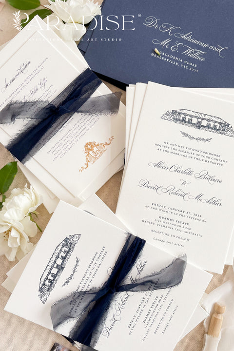 Elegant and refined, this letterpress wedding invitation suite brings classic artistry to modern romance. Featuring a custom hand-drawn illustration of your wedding venue, each piece is printed on luxurious cotton cardstock using the timeless technique of letterpress printing - creating a deep, tactile impression that you can both see and feel. The suite is accented with navy envelopes and tied with a silk ribbon, perfectly balancing sophistication with sentiment.