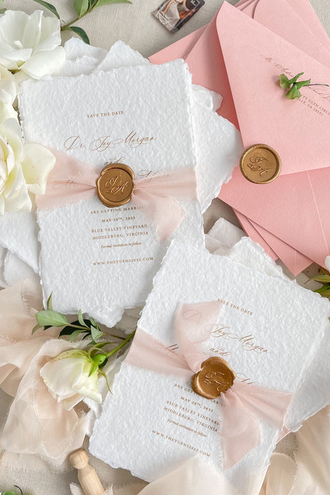Celebrate your love story with our handmade paper Save the Date cards, thoughtfully designed for couples who cherish timeless elegance and artistry. Each card is printed on luxury 100% cotton handmade paper with softly torn deckled edges, wrapped in a delicate blush silk ribbon, and finished with a hand-pressed wax seal.