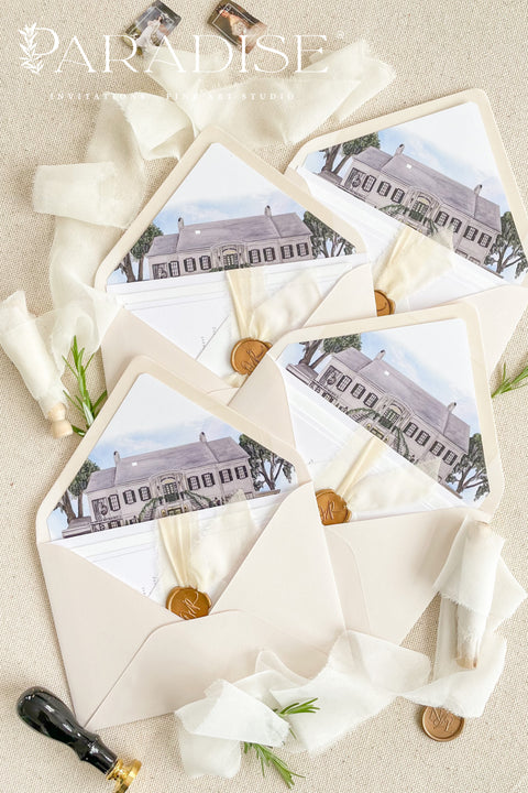 Wedding envelopes with watercolor venue liners, styled flat lay with ribbon and wax seals, showcasing hand-painted venue artwork for luxury invitation suites.