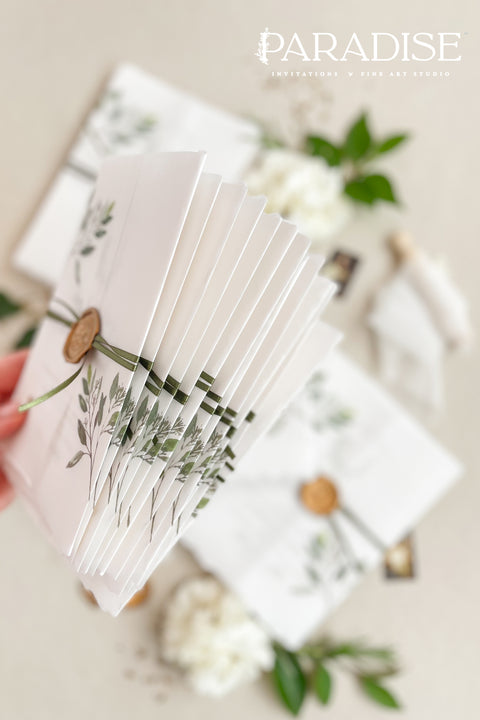 This exquisite wedding invites suite offers a blend of fine artistry and bohemian charm. Perfect for a garden wedding, each invitation is a work of art, featuring a beautifully illustrated floral monogram created just for you. Printed on luxurious fine art handmade deckle edge paper, this boho chic invite offers a rich, tactile feel and a timeless finish that will enchant your guests.