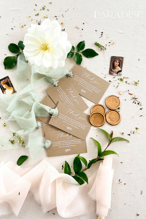 Express heartfelt gratitude with these beautifully designed thank you tags, created to elevate wedding favors and gift packaging. Printed on warm, earthy-toned cardstock with flowing calligraphy, each tag pairs effortlessly with soft ribbons, wax seals, and botanical details. Thoughtfully balanced between rustic charm and refined elegance, these thank you tags add a meaningful finishing touch to weddings, bridal showers, and intimate celebrations.