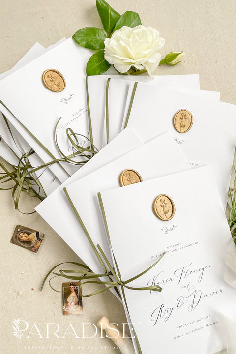 This wedding program is thoughtfully designed with clean typography, soft white cardstock, and an olive green ribbon tied by hand for a naturally elegant finish. A warm gold wax seal adds a touch of old-world charm, creating a harmonious blend of modern minimalism and classic detail. Perfect for couples who want a quiet, graceful aesthetic, this program offers a polished way to present your ceremony with style and intention.