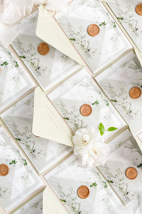 Invite your guests with elegance and charm through our botanical vellum wedding invitations, a handcrafted suite that captures the essence of romance and nature. Each invitation is wrapped in translucent vellum printed with delicate greenery illustrations, tied with a warm copper wax seal, and paired with sage green envelopes for a naturally refined look. Perfect for garden, outdoor, fine art, or destination weddings.