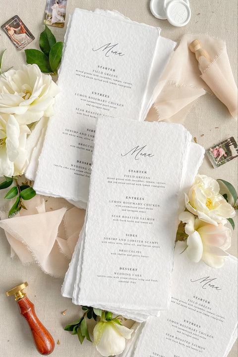 Elevate your tablescape with our handmade paper wedding menus, crafted from 100% cotton rag paper with elegant deckled edges. Each piece embodies timeless fine-art beauty, featuring minimalist typography and a tactile, organic texture that complements both romantic and modern weddings. Handmade with care using sustainable, tree-free materials, these menus are perfect for couples seeking eco-friendly luxury stationery.