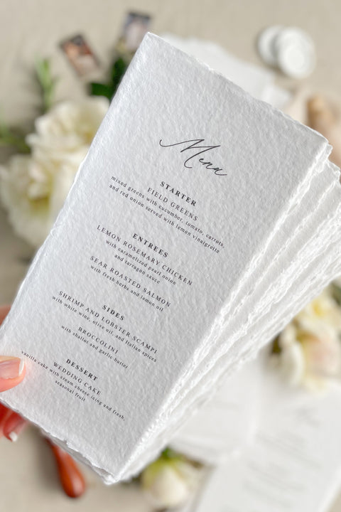Elevate your tablescape with our handmade paper wedding menus, crafted from 100% cotton rag paper with elegant deckled edges. Each piece embodies timeless fine-art beauty, featuring minimalist typography and a tactile, organic texture that complements both romantic and modern weddings. Handmade with care using sustainable, tree-free materials, these menus are perfect for couples seeking eco-friendly luxury stationery.