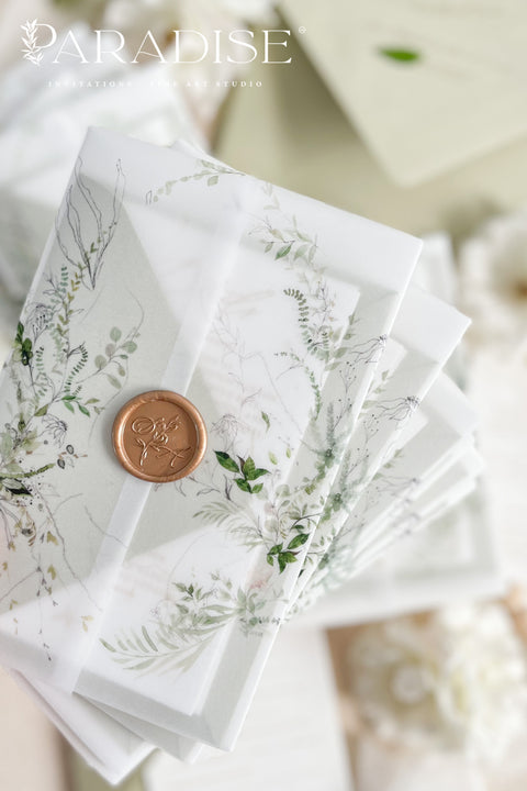 Invite your guests with elegance and charm through our botanical vellum wedding invitations, a handcrafted suite that captures the essence of romance and nature. Each invitation is wrapped in translucent vellum printed with delicate greenery illustrations, tied with a warm copper wax seal, and paired with sage green envelopes for a naturally refined look. Perfect for garden, outdoor, fine art, or destination weddings.