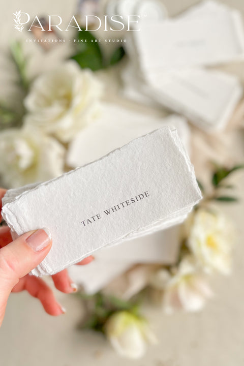 Add refined simplicity to your event with our handmade paper place cards, crafted from premium cotton rag paper and finished with naturally torn deckled edges. Each name tag features minimalist printed lettering and a soft fine-art aesthetic, making them perfect for weddings, rehearsal dinners, intimate gatherings, and elegant celebrations. These artisan-crafted cards bring understated beauty, organic texture, and timeless charm to any tablescape.