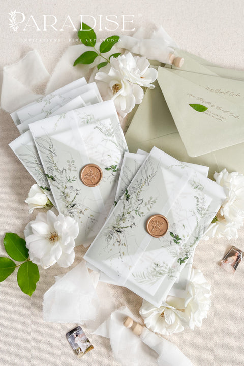 Invite your guests with elegance and charm through our botanical vellum wedding invitations, a handcrafted suite that captures the essence of romance and nature. Each invitation is wrapped in translucent vellum printed with delicate greenery illustrations, tied with a warm copper wax seal, and paired with sage green envelopes for a naturally refined look. Perfect for garden, outdoor, fine art, or destination weddings.