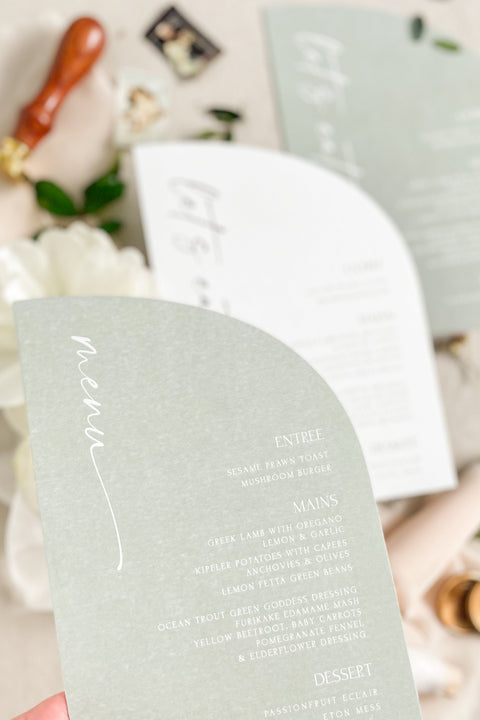Add a touch of modern charm to your tablescape with our half arch wedding menus, featuring minimalist typography and soft contemporary hues. Printed on premium textured cardstock, these menus perfectly blend fine-art aesthetics with clean, modern lines. Ideal for romantic garden celebrations or elegant minimalist weddings, they bring sophistication and style to every table setting.
