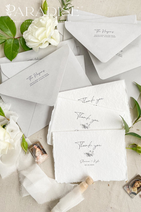 Express gratitude with understated elegance through these handmade paper thank you cards. Crafted from luxurious cotton rag paper with naturally deckled edges, each card features refined typography and a soft, minimalist aesthetic. Designed to pair beautifully with fine-art wedding stationery, these cards offer a timeless way to thank your guests while becoming a keepsake they’ll cherish long after your celebration.