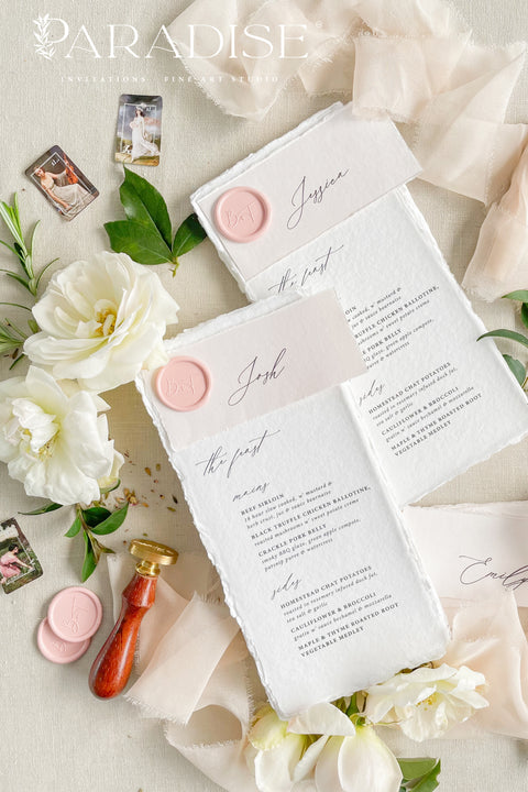 Add a touch of soft romance and artisanal beauty to your tablescape with our embossed handmade paper wedding menus - a refined blend of texture, craftsmanship, and elegance. Each menu is meticulously crafted from 100% cotton rag paper with delicate deckled edges, offering a luxurious, organic feel that sets the tone for your celebration.