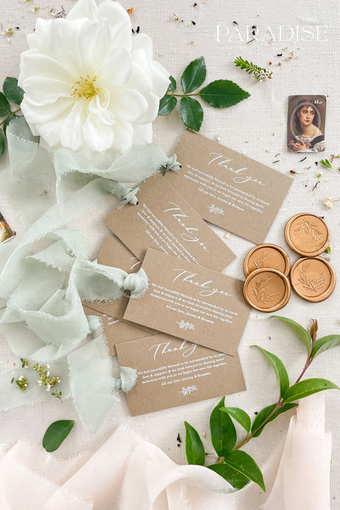 Express heartfelt gratitude with these beautifully designed thank you tags, created to elevate wedding favors and gift packaging. Printed on warm, earthy-toned cardstock with flowing calligraphy, each tag pairs effortlessly with soft ribbons, wax seals, and botanical details. Thoughtfully balanced between rustic charm and refined elegance, these thank you tags add a meaningful finishing touch to weddings, bridal showers, and intimate celebrations.
