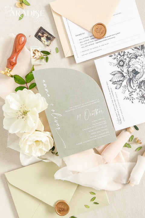 This half arch wedding invitation suite blends modern minimalism with soft botanical charm - perfect for couples who adore natural tones and elegant simplicity. The sage green half-arch invitation features contemporary typography, paired beautifully with neutral envelopes, blush ribbons, and gold wax seals, creating a look that’s refined yet organic. Printed on luxury cardstock, each invitation feels substantial and smooth to the touch, making it both a visual and tactile delight.