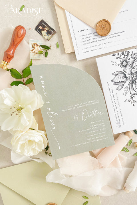 This half arch wedding invitation suite blends modern minimalism with soft botanical charm - perfect for couples who adore natural tones and elegant simplicity. The sage green half-arch invitation features contemporary typography, paired beautifully with neutral envelopes, blush ribbons, and gold wax seals, creating a look that’s refined yet organic. Printed on luxury cardstock, each invitation feels substantial and smooth to the touch, making it both a visual and tactile delight.