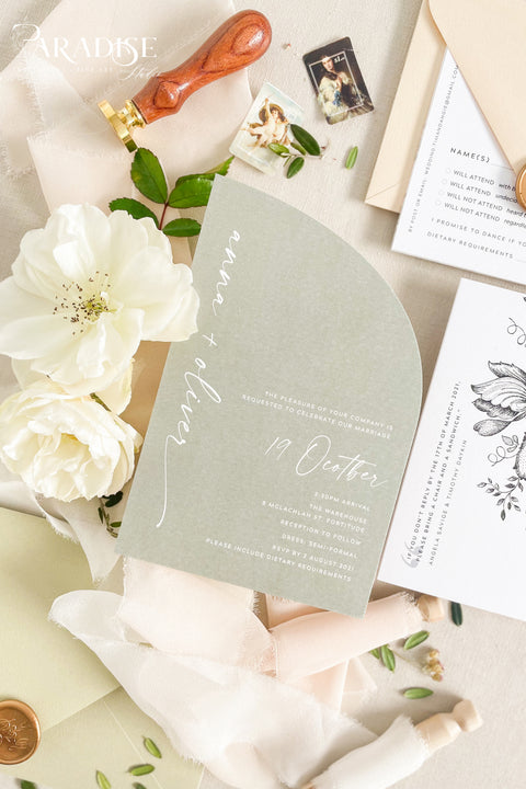 This half arch wedding invitation suite blends modern minimalism with soft botanical charm - perfect for couples who adore natural tones and elegant simplicity. The sage green half-arch invitation features contemporary typography, paired beautifully with neutral envelopes, blush ribbons, and gold wax seals, creating a look that’s refined yet organic. Printed on luxury cardstock, each invitation feels substantial and smooth to the touch, making it both a visual and tactile delight.