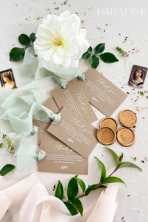 Express heartfelt gratitude with these beautifully designed thank you tags, created to elevate wedding favors and gift packaging. Printed on warm, earthy-toned cardstock with flowing calligraphy, each tag pairs effortlessly with soft ribbons, wax seals, and botanical details. Thoughtfully balanced between rustic charm and refined elegance, these thank you tags add a meaningful finishing touch to weddings, bridal showers, and intimate celebrations.