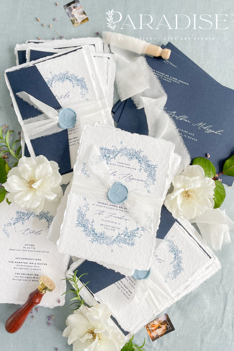 Set a sophisticated and thoughtful tone for your coastal celebration with these unique wedding invites. Perfect for a beach wedding, this suite features a classic navy theme with a beautifully designed wedding timeline to guide your guests through your special day. The elegant calligraphy design adds a touch of classic romance, while the eco-conscious materials ensure your stationery is a beautiful and responsible choice for your special day.