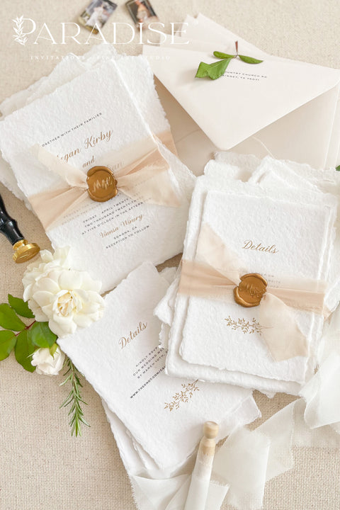 Announce your marriage with a romantic and modern touch. This exquisite suite features elegant modern calligraphy and shimmering golden ink printed on luxurious handmade paper with a delicate deckle edge. The combination of the beautiful golden shine and the unique, textured paper creates a stunning first impression that is both luxurious and organic. These unique invites are perfect for setting a sophisticated and romantic tone for your special day.
