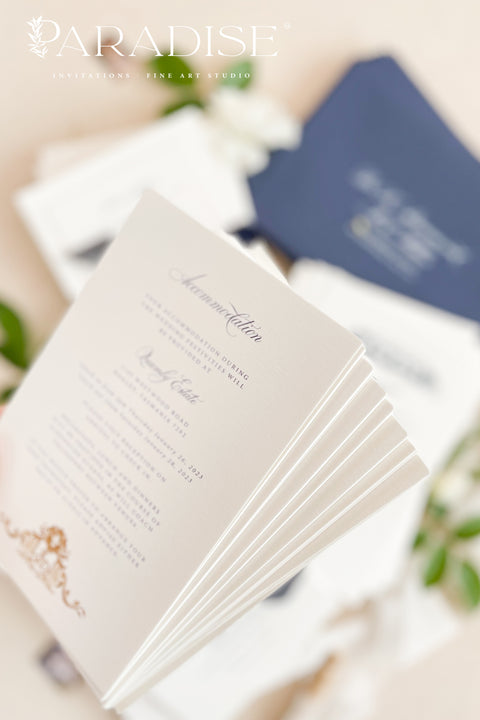 Elegant and refined, this letterpress wedding invitation suite brings classic artistry to modern romance. Featuring a custom hand-drawn illustration of your wedding venue, each piece is printed on luxurious cotton cardstock using the timeless technique of letterpress printing - creating a deep, tactile impression that you can both see and feel. The suite is accented with navy envelopes and tied with a silk ribbon, perfectly balancing sophistication with sentiment.