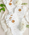 Refine your tablescape with our handmade paper wedding menus with personalized name tags, a luxurious detail that blends artistry and function. Each menu is printed on deckled-edge cotton paper and wrapped in a soft handmade band topped with a vintage gold wax seal - creating a timeless, cohesive aesthetic. Designed for elegant fine-art weddings, these menus double as place cards, adding personalization and charm to every seat.
