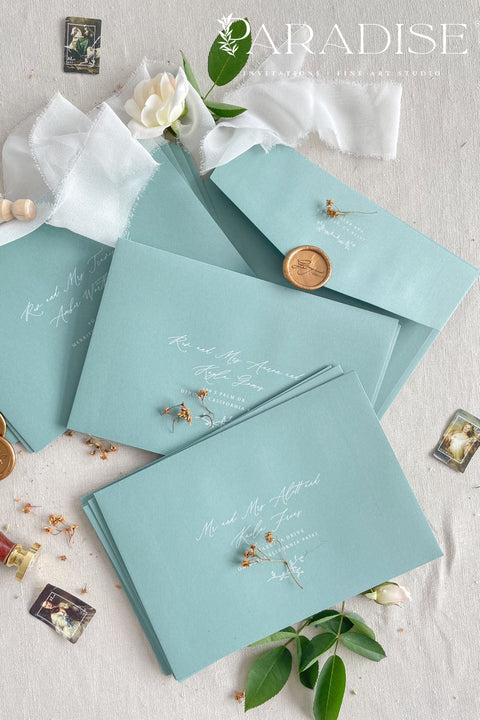 Luxury sage wedding envelopes with white ink address printing made from premium paper, designed for elegant and nature-inspired invitation suites.