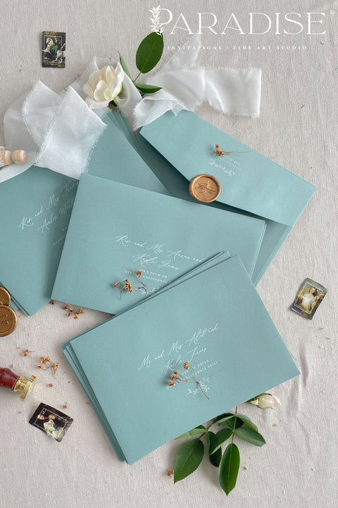 Luxury sage wedding envelopes with white ink address printing made from premium paper, designed for elegant and nature-inspired invitation suites.
